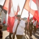 Flag bearers at the National Day Parade in Nuuk in Greenland on June 21, by Mads Pihl